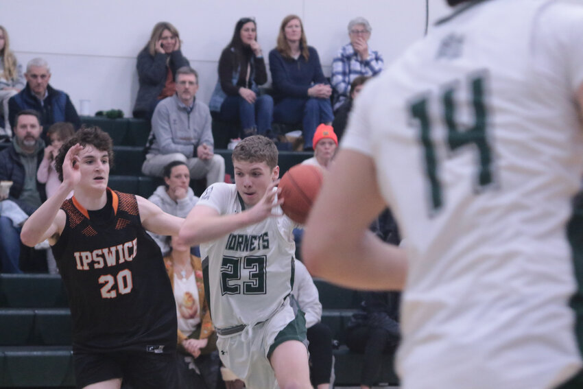Jake Zschau driving to the hoop against Ipswich in a recent game against Ipswich where the Hornets defeated the Tigers 72-51.