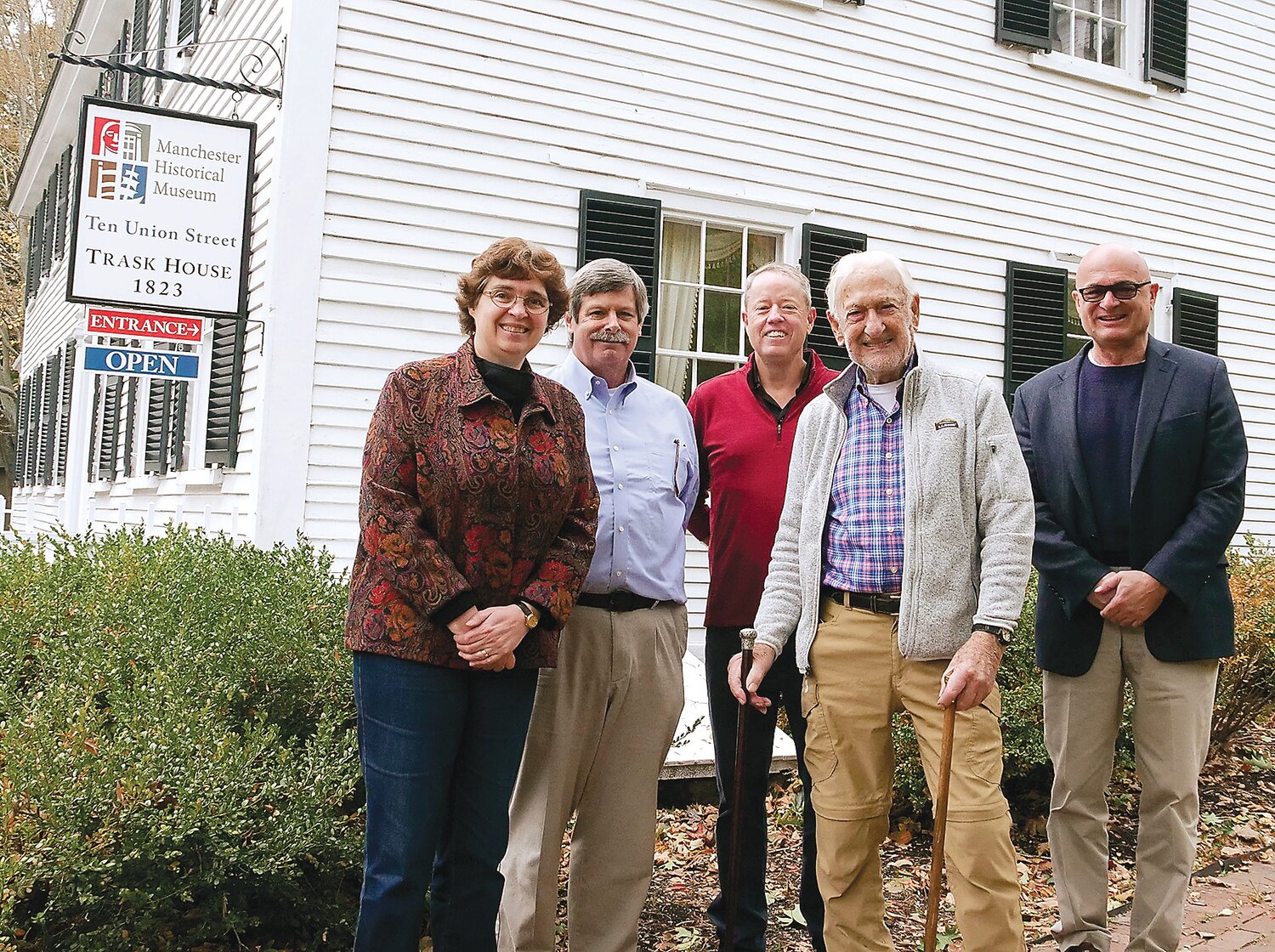 From left, Beth Wellin, Manchester Historical Museum executive director, Elder Brethren’s Mike Chapman and Joe Willwerth (currently president), Gordon MacDougal (holding both canes), and Rus Brown, 2021 museum president