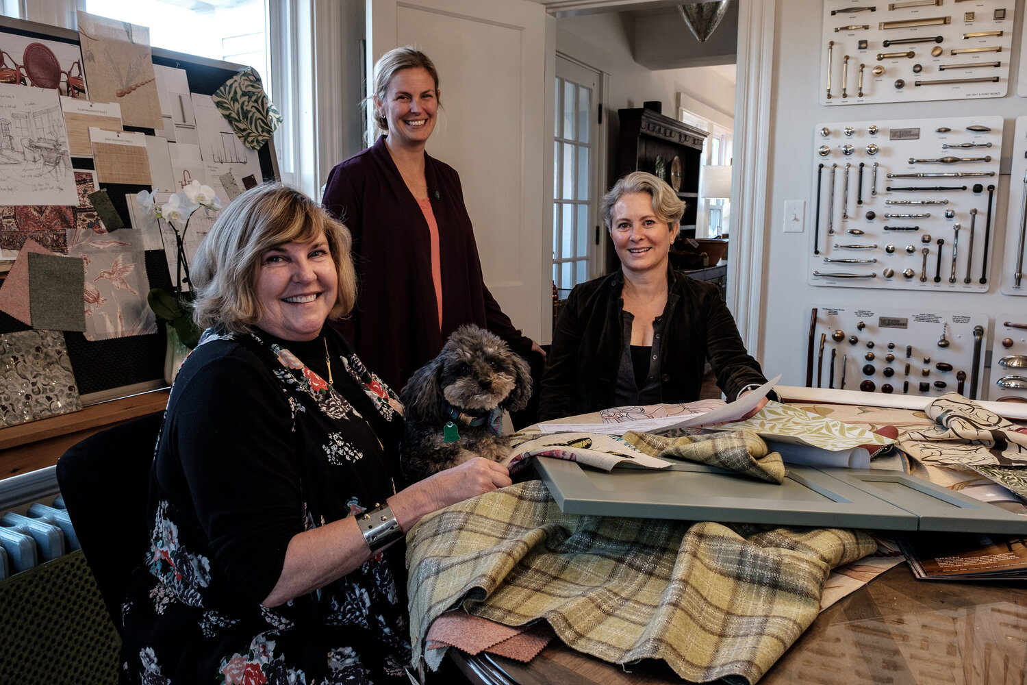 In Home Design Center, which moved to Essex last year.  From left, company founder Anna Hardy, kitchen designer Stephanie Brillant, and Catherine Fenn-Smith, art and client services specialist (Photo: Kirk Williamson)