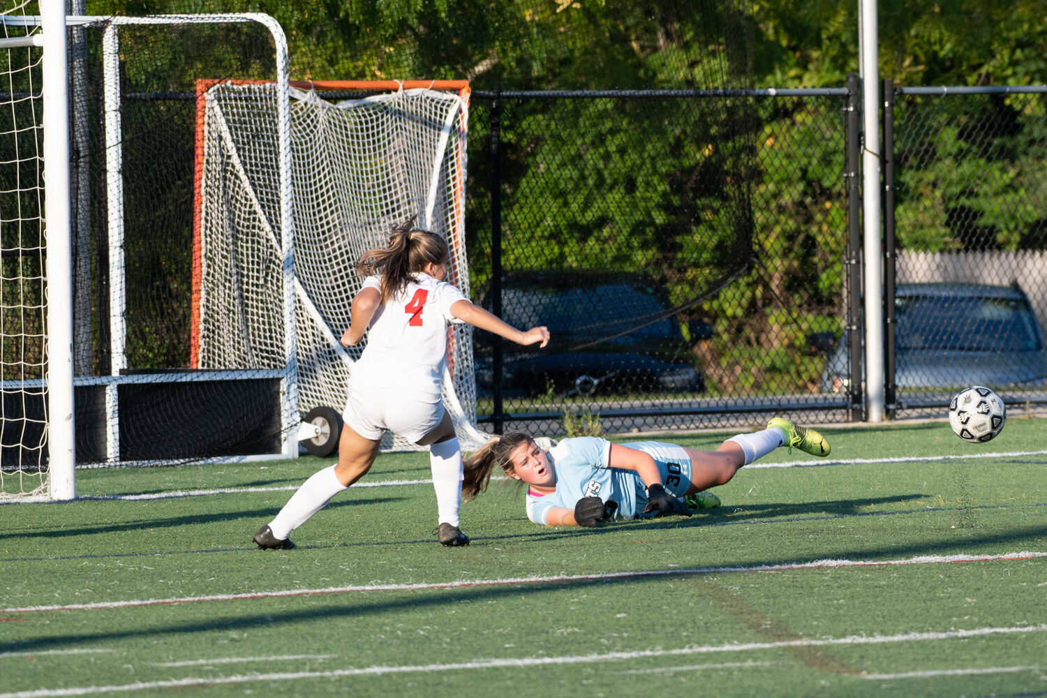 ME Freshman keeper Madi Cook makes a diving save against the Amesbury Indians during Monday’s home game at Hyland Field.