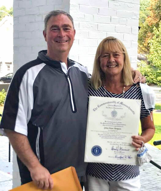 Retiring Manchester Assessor Virginia “Ginny” Thompson with Massachusetts Rep. Brad Hill, who made a special trip to present Thompson with a citation of service over her distinguished career, including 26 years at Manchester Town Hall.