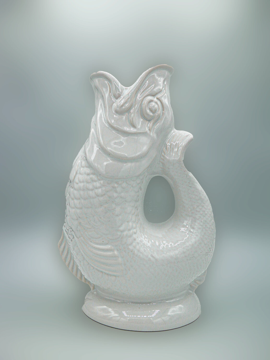 The “Gurgling Cod” pitcher is a classic that gets its name from the “glugging” sound made while pouring water, a happy byproduct of the curvature of the jug’s design.  For years, gurgling cod pitchers were only available at Shreve Crump &amp; Low on Boylston Street (now on Newbury Street).  Now they are more widely available.  This one, at Lulu’s Pantry in Rockport, is based on an early English design and it’s a steal at $56.  Gurgle away! 