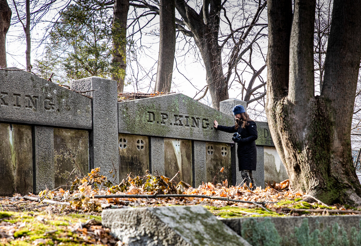Christy King visits her ancestor Daniel Putnam King's family burial vault at the King Cemetery on Lowell Street in Peabody, Mass.