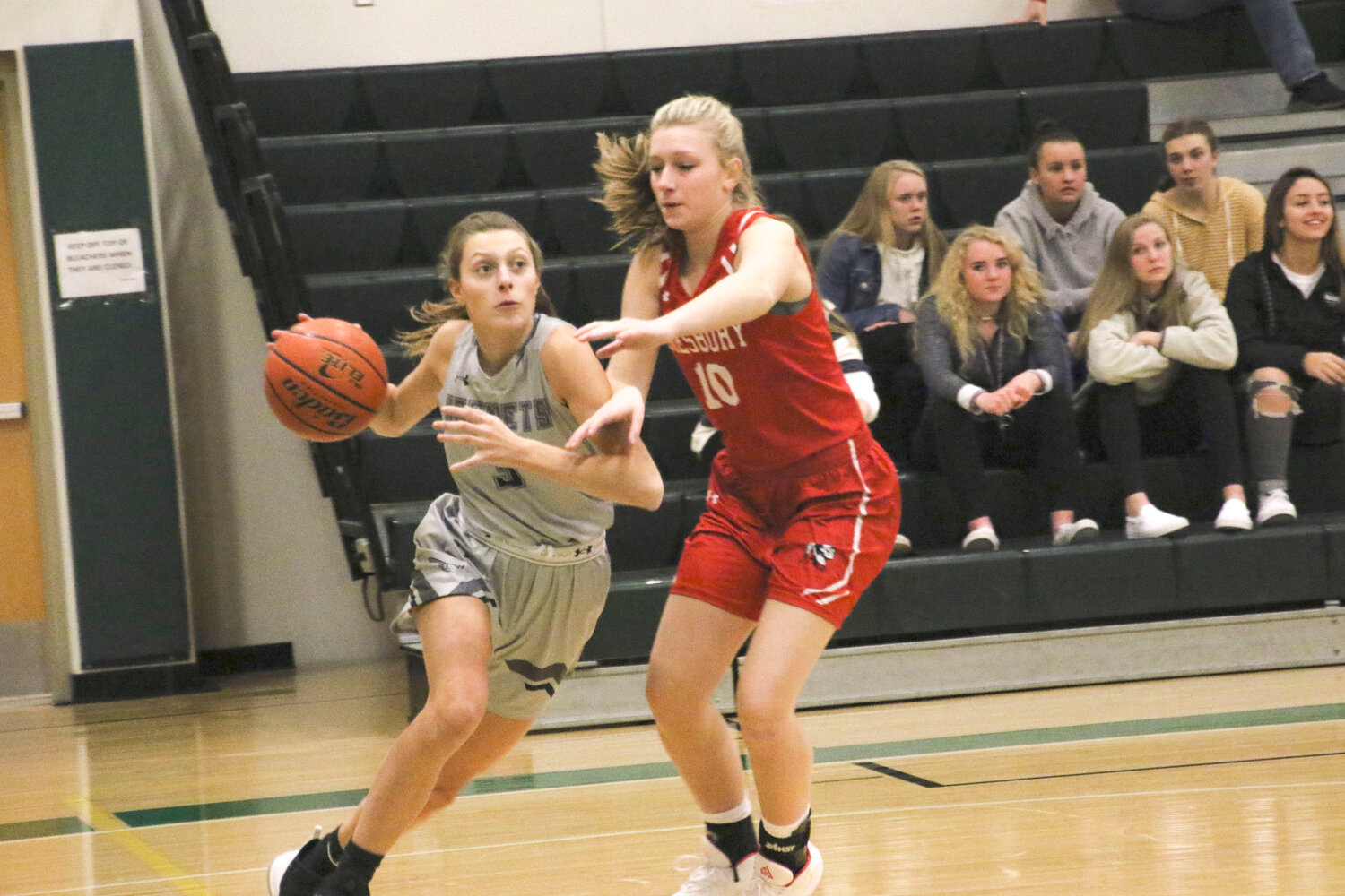 JANUARY | Great Effort Against Top TeamME Hornet #3, Sophomore Emma Fitzgerald, drives to the hoop for a successful two-pointer in the Hornets match against Amesbury at home on Monday.  Amesbury Indians number one in the Baker Division of the CAL, came away on top 54-40.