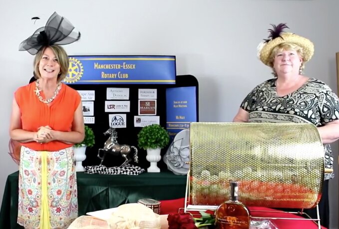 It wasn’t the Manchester-Essex Rotary Club’s “normal” Kentucky Derby-themed raffle drawing this year, but the club pulled off a fantastic job via Facebook “Live” broadcast from the Manchester Cricket offices.  Left, Jennifer Doane of the Rotary hosted, with Julie LaFontaine, executive director of The Open Door sharing all the good the club has done for worthy organizations on Cape Ann. 