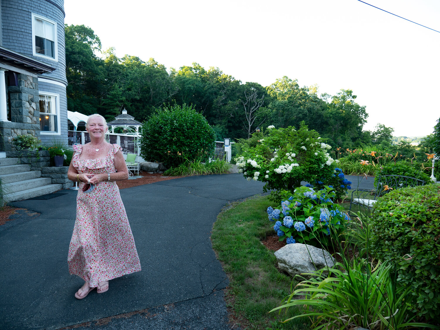 Laura Baker is owner and inn keeper of Gloucester’s Castle Manor Inn.  Her property’s big elevated outdoor deck is a big draw for weddings.  This summer, it’s big with those looking for outdoor dining on Cape Ann. 