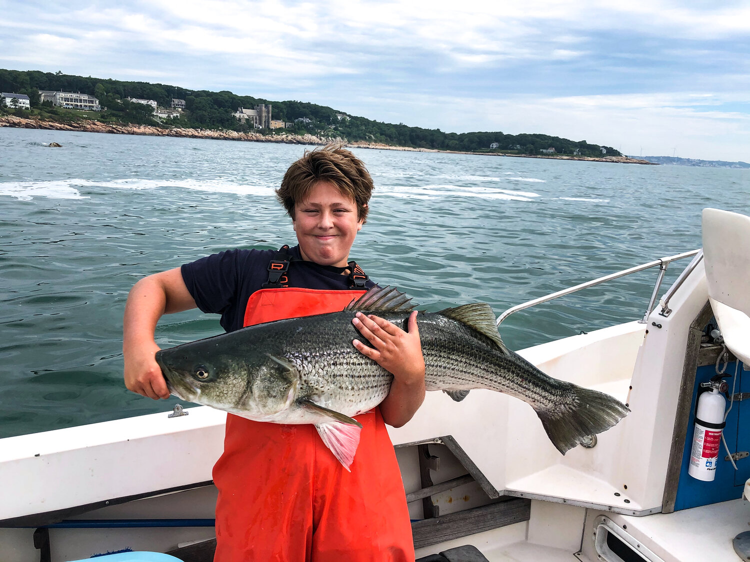 Anthony Brown, winner of the Biggest Striper – Boat (age 12 and under) category with a 43-inch long Striper! 