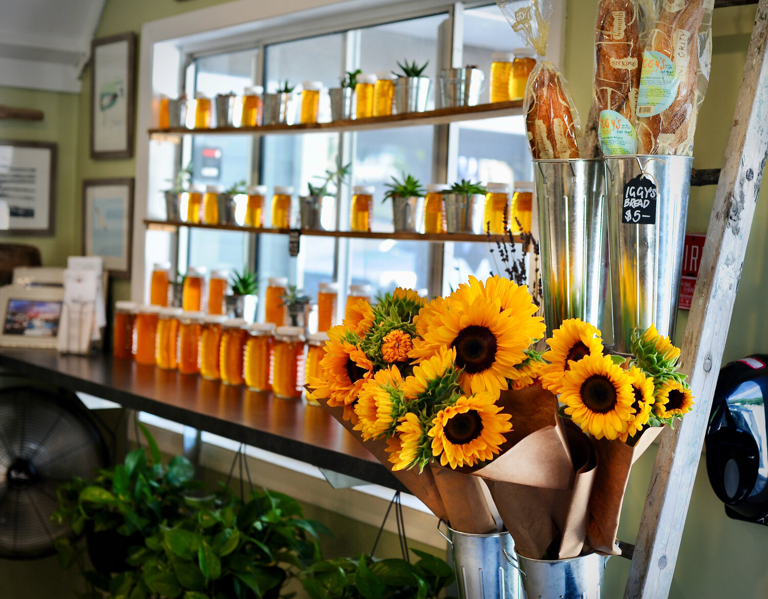 Amongst the gourmet provisions offered at The Mill are local raw honey, fresh flowers, and baguettes. 