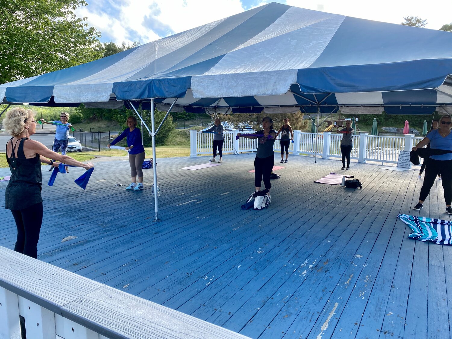 Last week the MAC held its first outdoor group class, Yoga Fit, under a large tent by the pool and outdoor café.