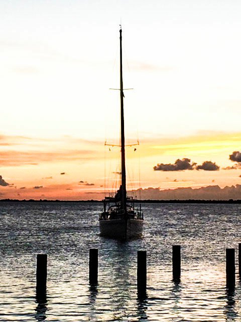 Picture of our boat on its Bonaire mooring at sundown. 