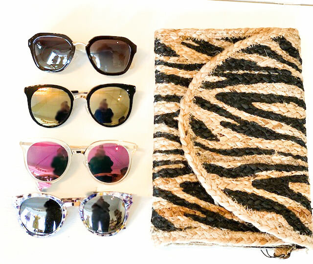 Handbags and sunglasses at StyleSnoop