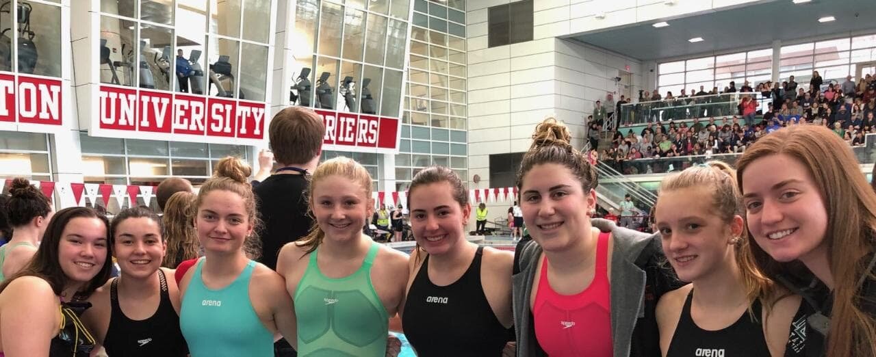 The Hornets Girls Swim Team placed 11th out of 42 teams at the Division 2 State Meet on Saturday. Pictured, from left to right, is Carson Komishane, Maddie Carvalho, Emma Ketchum, Alex Briggs, Elizabeth Athanas, Greta Gado, and Greta Dickson. 