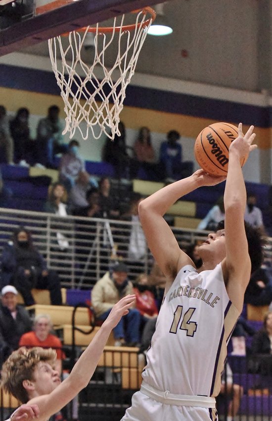 Cartersville senior Robert Novak goes up for a shot against Sonoraville during a non-region game Tuesday at The Storm Center. Novak finished with a game-high 21 points in a 57-52 defeat.