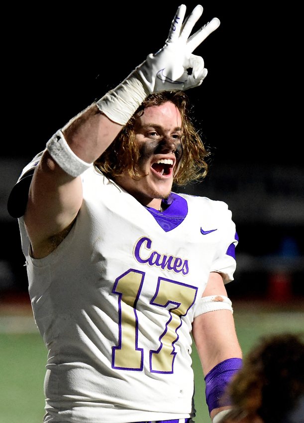 Cartersville linebacker Gavin Geros celebrates after the Canes defeated St. Pius X Friday night in Chamblee to advance to the Class 5A state quarterfinals.