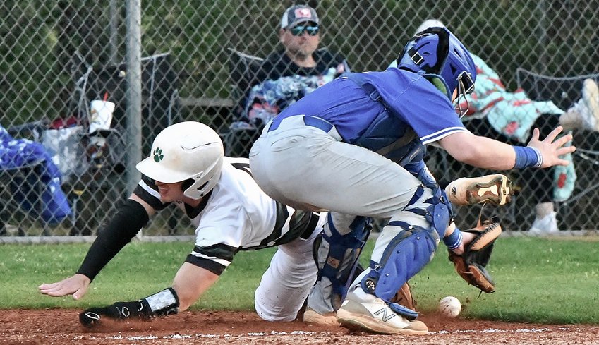 Adairsville sophomore Hayden Blalock scores the tying run in the bottom of the sixth inning during a Region 6-3A matchup against Ringgold April 14 at home.