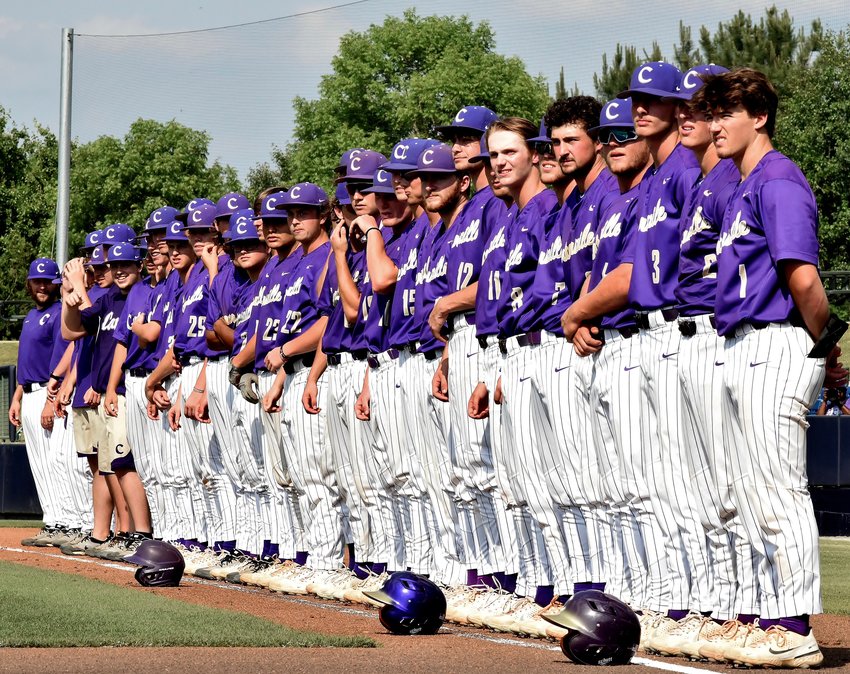 The Cartersville baseball team lines up during introductions for Game 1 of the Class 5A state championship series against Loganville May 21 at AdventHealth Stadium.