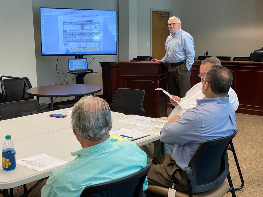 Tom Sills, transportation planner for the Cartersville-Bartow County Metropolitan Planning Organization, takes to the podium at a public meeting in 2021.