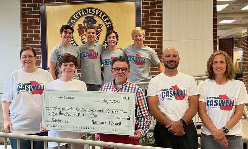 Attending Cartersville High School rising senior Harrison Caswell&rsquo;s check presentation to Georgia Center for Civic Engagement President and CEO Dr. Randell E. Trammell were front row, ENGAGE Advisor Sarah Boy, Cartersville City Schools Superintendent Dr. Marc Feuerbach and Cartersville High School Principal Shelley Tierce; and back row from left, Cainen Crowder, Chandler Mathison, Ben Caswell and Nate Hardy.
