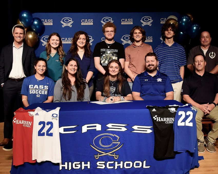 Cass High senior Morgan Tompkins signed to play soccer at Bluefield State College in Bluefield, West Virginia. On hand for the signing were, from left, front row: Tarah Piccirilli, CHS head girls soccer coach; Rachel Tompkins, mother; Clark Tompkins, father; Sid Gowens, Rome Arsenal club coach; back row, Steve Revard, CHS principal; McKinzie Tompkins, sister; Emily Tompkins, aunt; Jordan Tompkins, cousin; Montgomery Tompkins, brother; Mason Tompkins, brother; and Bobby Hughes, CHS athletic coordinator.