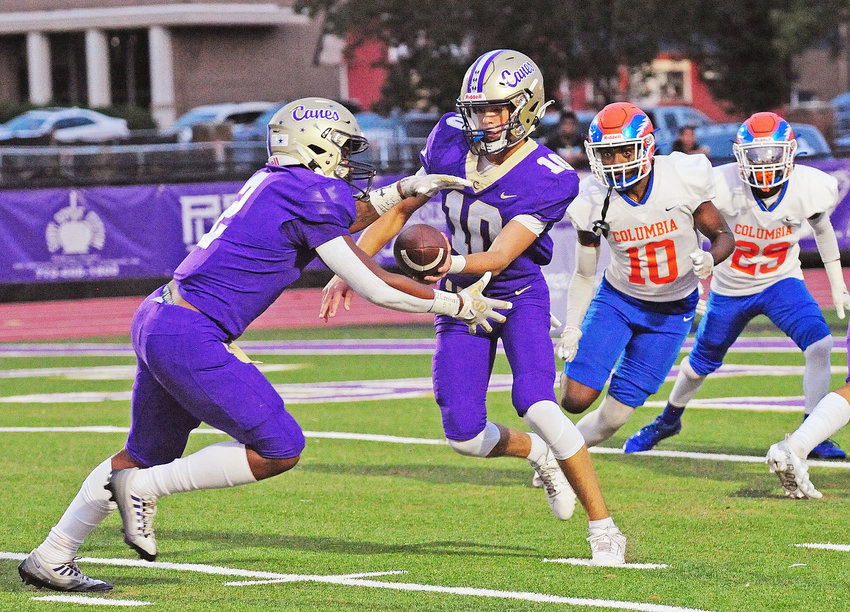 Cartersville running back Malachi Jeffries takes the handoff in a game earlier this year. The Hurricanes will host Woodland on Friday.