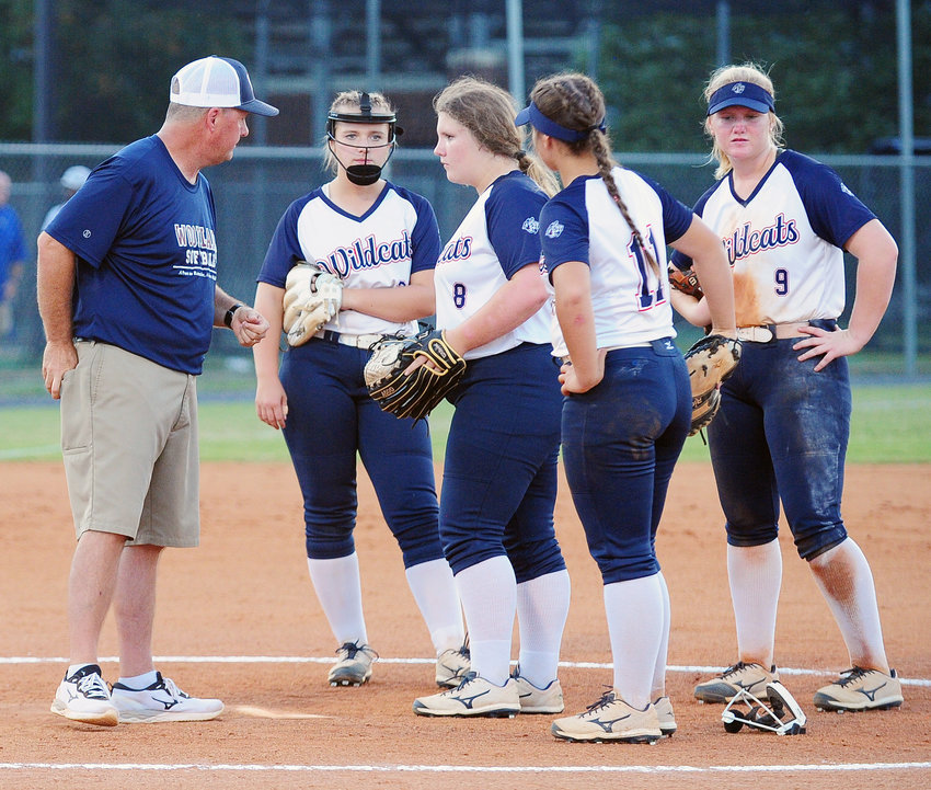 Woodland Coach Todd Eubanks talks to his team during a game earlier this year. Woodland split a pair of games on Thursday in the Super Regionals.