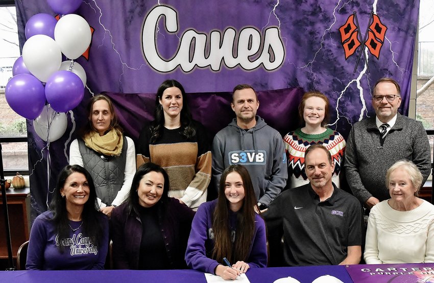 Cartersville High senior Lauren Lawson signed to play beach volleyball with Grand Canyon University in Phoenix, Arizona. On hand for the signing were, front row, from left: Nicole Christner, private coach; Maria Lawson, mother; John Lawson, father; and Mary Duval, grandmother. Back row: Shelley Tierce, CHS principal; Alicen Pearson, CHS head volleyball coach; Brian Jones, club coach; Abbey Rogers, CHS assistant volleyball coach; and Darrell Demastus, CHS athletic director.