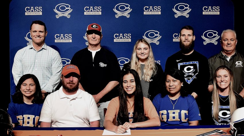 Cass High senior Haylee Dishmon signed to play softball at Georgia Highlands College in Cartersville. On hand for the signing were, front row, from left: Kaylee Dishmon, sister; Troy Dishmon, father; Mikaena Dishmon, mother; and Taylor Washington, CHS head softball coach. Back row: Steve Revard, CHS principal; Randy Lee, family friend; Sierrah Woods, CHS assistant softball coach; Tyler Washington, CHS assistant softball coach; and Dr. Nicky Moore, CHS athletic director.