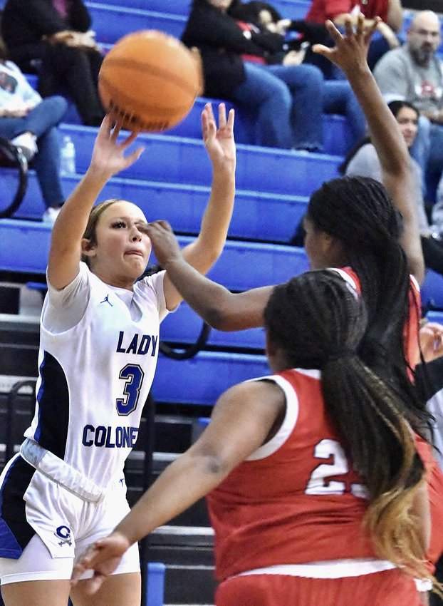 Cass' Reese Howard fires off a three-point attempt during the Lady Colonels loss to Dalton on Friday.