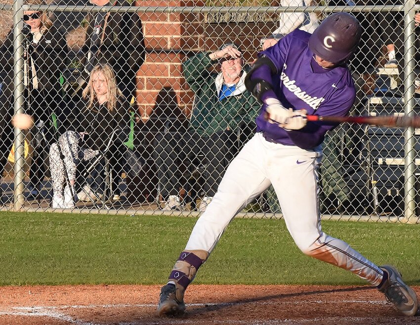 Caleb Daniel drives a base hit for Cartersville in the Cane's 13-6 win over Adairsville on March 10.