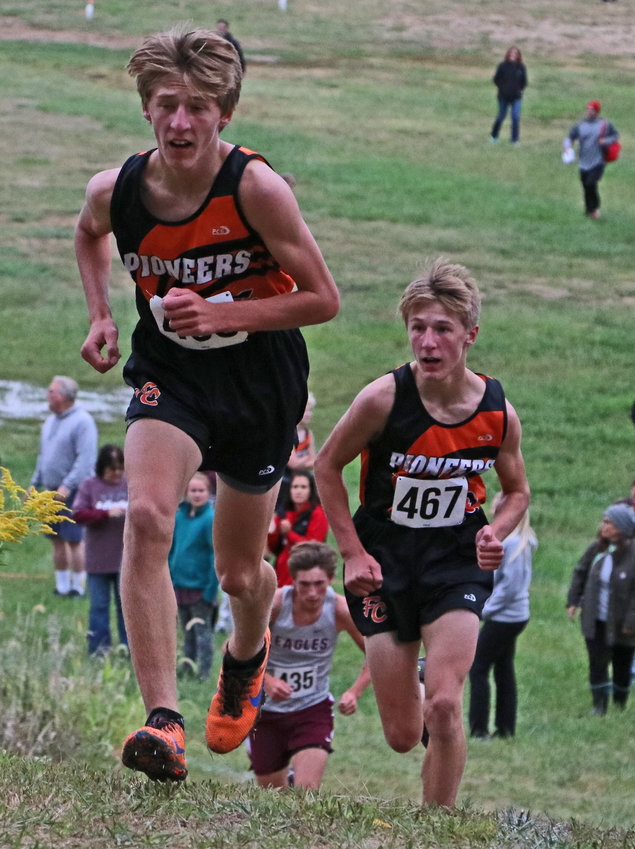 Lance, left, and Ely Olberding of Fort Calhoun race up a hill Thursday at the Washington County Fairgrounds.