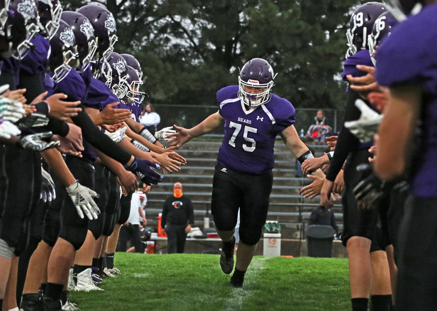 Blair lineman Cole Truhlsen, middle, is introduced prior to Friday's Senior Night game against Beatrice at Krantz Field.