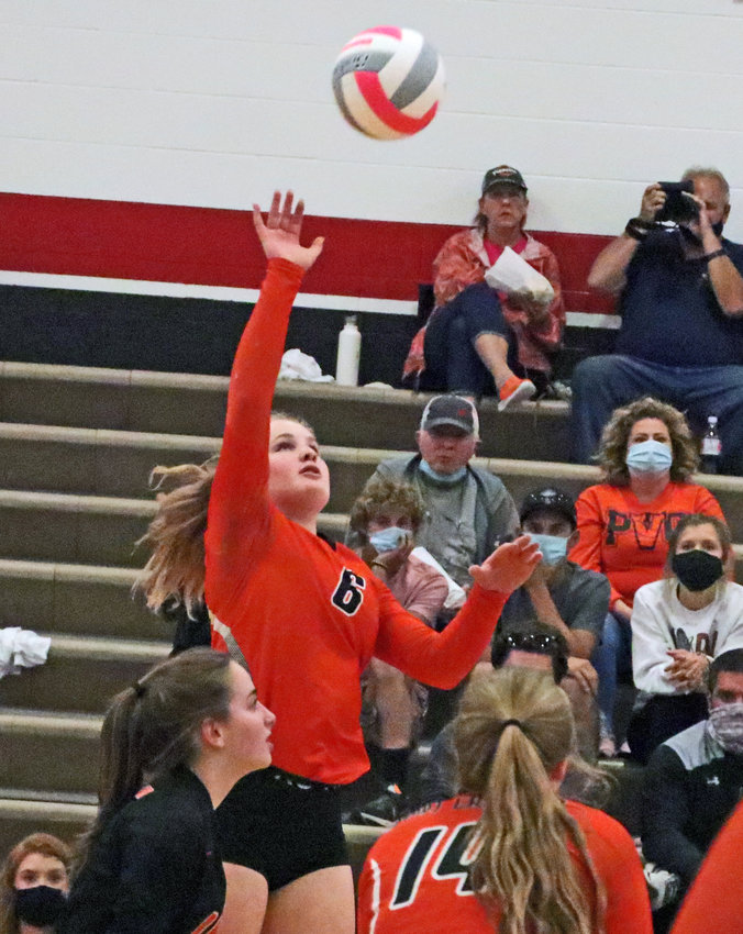 Fort Calhoun's Raegen Wells hits the ball over the net Tuesday at Douglas County West.