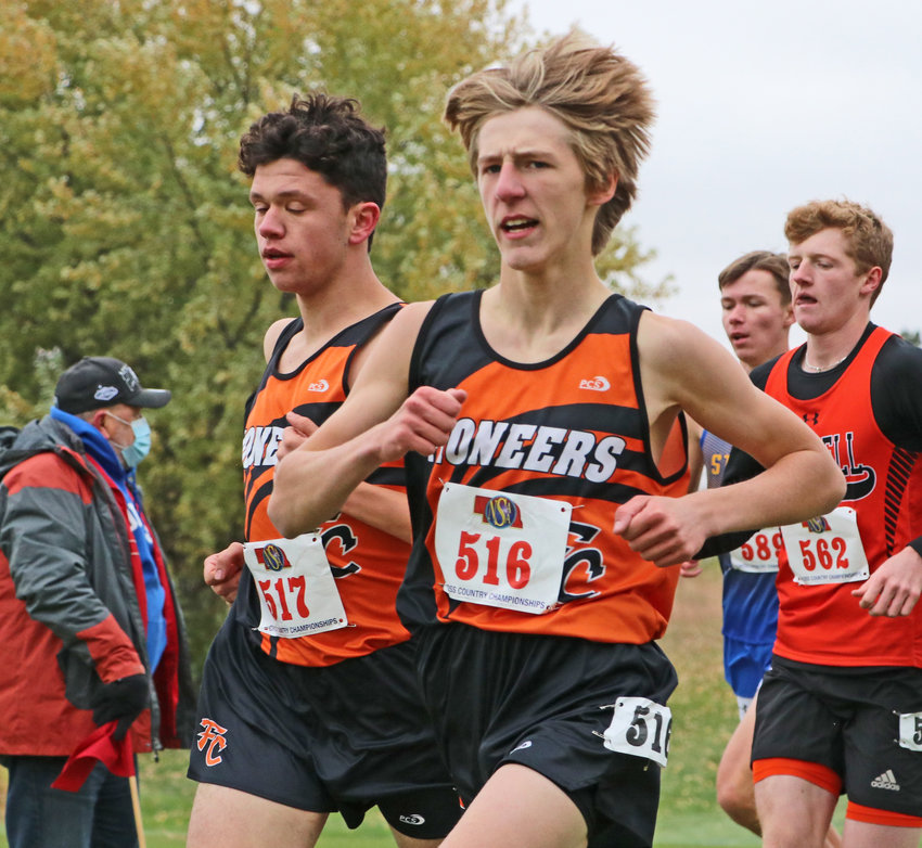 Fort Calhoun's Jacob Rupp, left, and Lance Olberding run Friday during the NSAA State Cross Country Championships in Kearney. Rupp earned a state medal in 13th place.