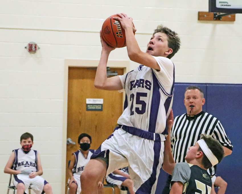 Bears eighth-grader Nelson Kosch goes up for a layup Monday at Otte Blair Middle School.