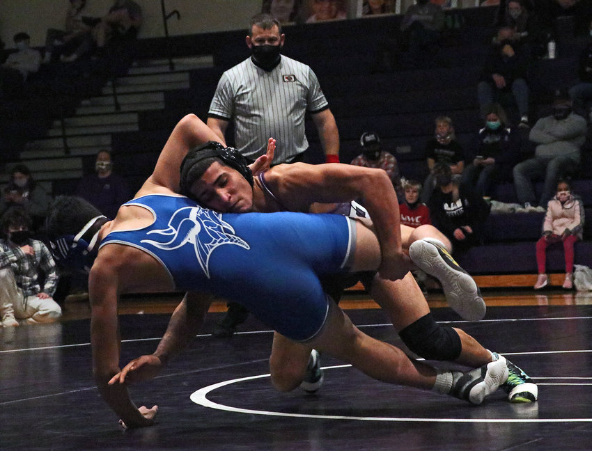Bears 152-pounder Yoan Camejo, facing, scores a takedown against Columbus Lakeview's Yordi Dominguez on Friday at Blair High School.