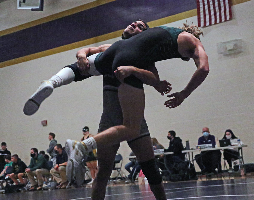 Bears 152-pounder Yoan Camejo picks up his Gretna opponent Tuesday at Blair High School.