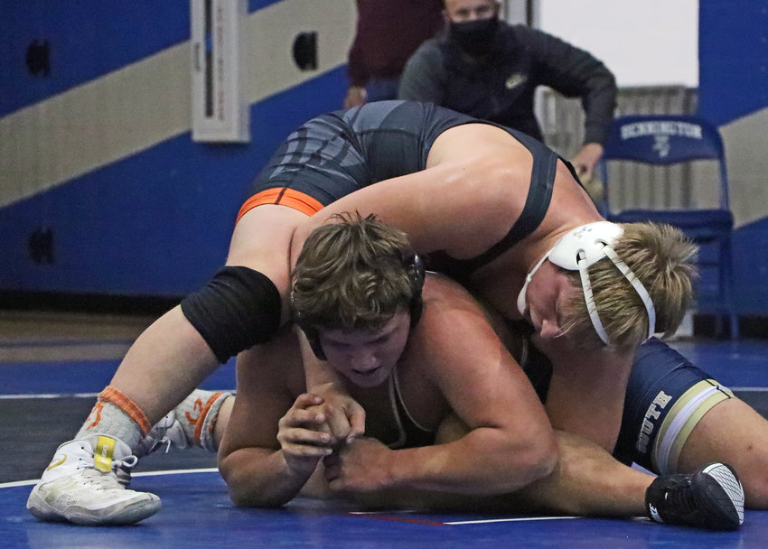 Fort Calhoun 220-pounder Jesse Hartline, top, was one of seven Pioneers to advance through his subdistrict bracket and earn a place in next Saturday's district tourney in Albion.