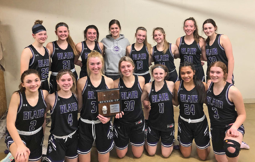 The Blair girls basketball team poses with their district runner-up plaque on Saturday in York. Team members are, front row, from left: Sami Murray, Reese Beemer, Maicy Lourens, Ella Ross, Mya Larson, Allison Hernandez and Kaitlyn Johnson. Second row: Nessa McMillen, Joslyn Policky, Maggie Valasek, Avory French, Leah Chance, Kalli Ulven, Makayla Baughman and Jordan Wolfe.