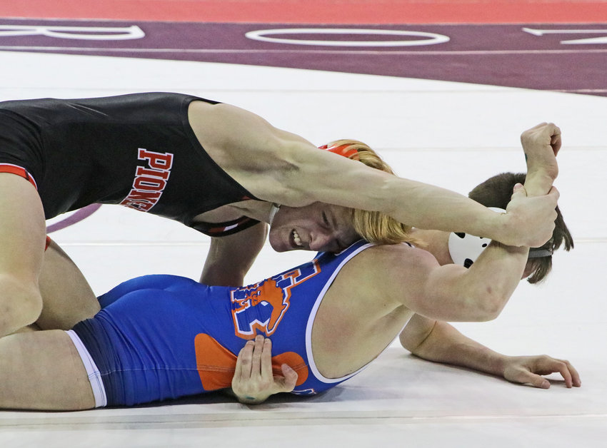 Fort Calhoun 120-pounder Lance Olberding, top, maintains arm control against Gordon-Rushville's Tucker Banister on Friday during the NSAA State Championships in Omaha.