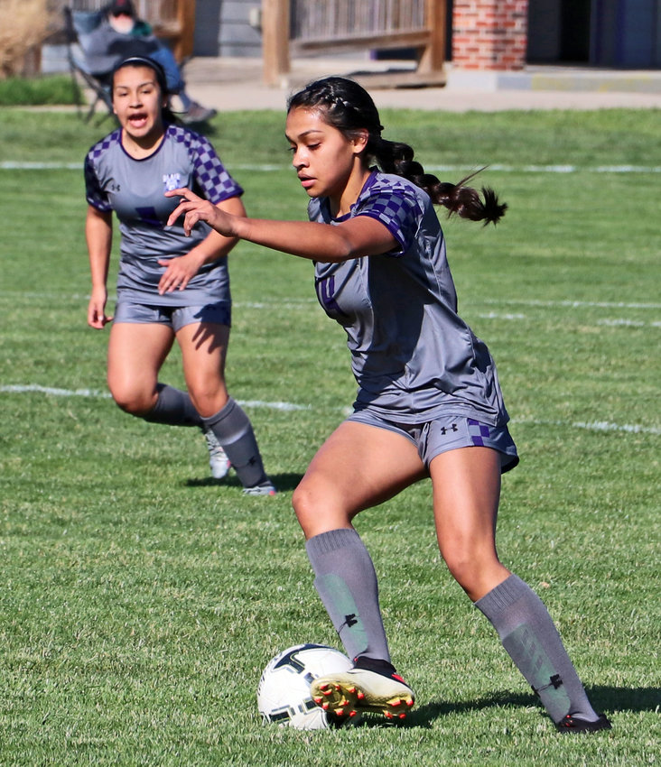 The Bears' Allison Hernandez dribbles the ball upfield Tuesday at the Blair Youth Sports Complex.