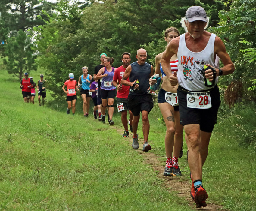 John Ritland of Omaha leads a pack of runners Saturday at Black Elk-Neihardt Park.