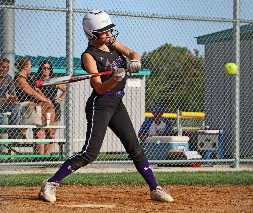 Blair junior varsity batter Brea Flaherty takes a swing Tuesday against Omaha Gross at the Youth Sports Complex. The JV Bears fell to the Cougars, but the varsity later earned a run-rule victory.