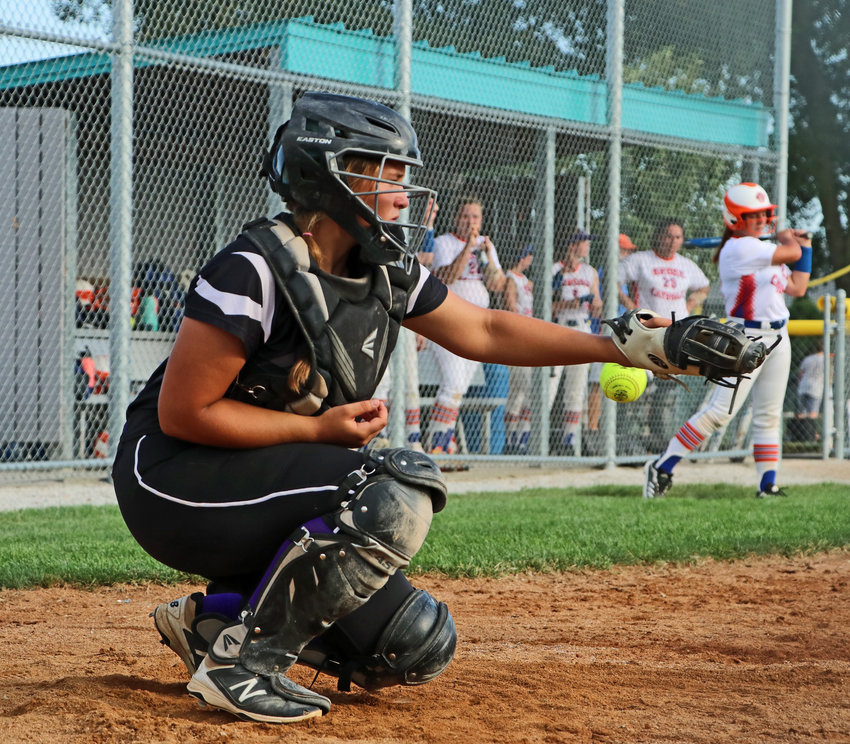The ball gets by Blair junior varsity catcher Wrylee Osterhaus on a foul tip Tuesday at the Youth Sports Complex.