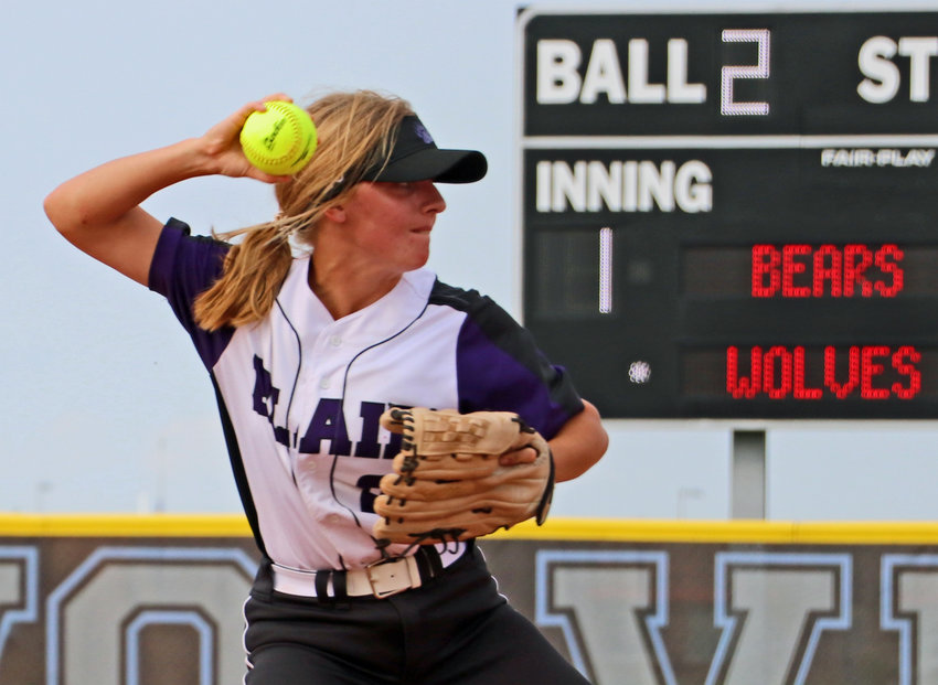 Blair infielder Taylor Larson throws the ball to first base for an out Monday at Elkhorn North.