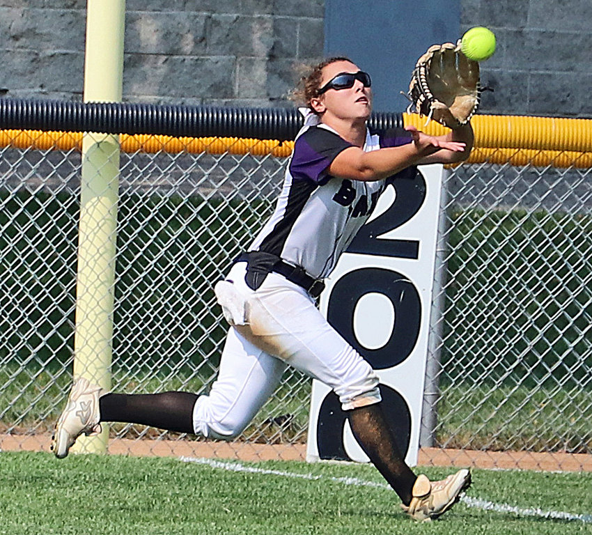 Cailey Anderson of Blair makes a catch down the right field line Saturday at the Youth Sports Complex.