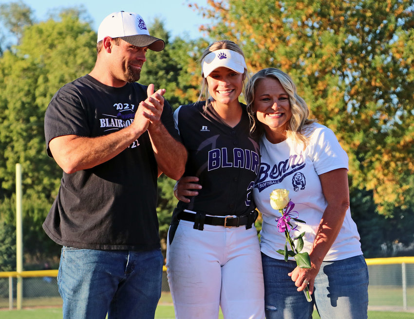 Blair softball senior Jerzie Janning and her parents were recognized before Tuesday's home game against Elkhorn at the Youth Sports Complex.