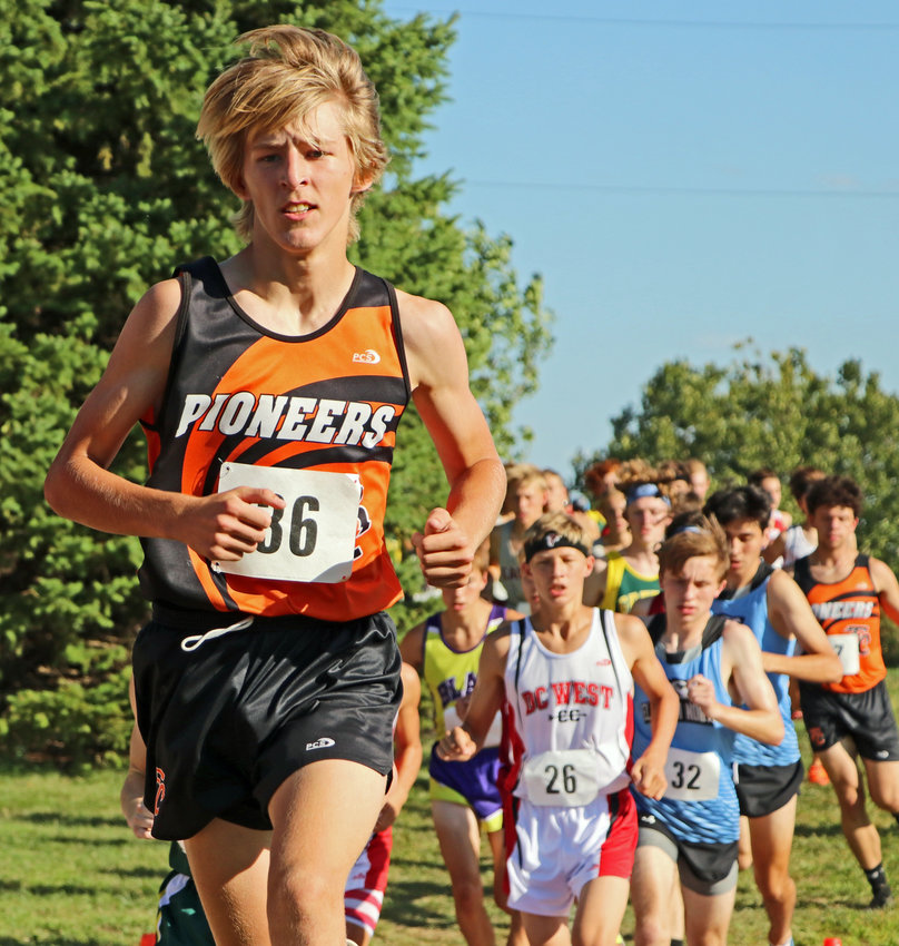 Fort Calhoun's Lance Olberding leads a pack of runners Thursday during the Blair XC Invitational.