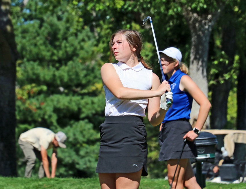 Blair's Anna Moore watches her tee shot on No. 17 Tuesday at Fremont Golf Club.