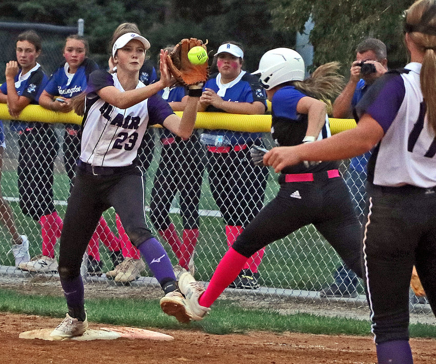 Bears first baseman Claire Mann gloves the throw to first base for an out against Bennington on Thursday at the Blair Youth Sports Complex.