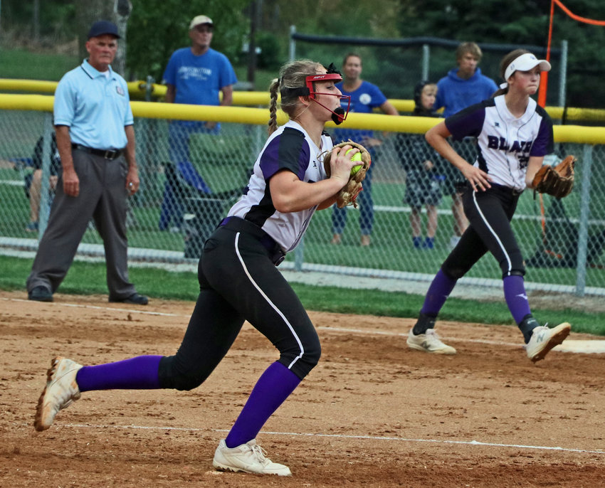 Bears right-hander Kalli Ulven steps toward the plate on a pitch Thursday at the Blair Youth Sports Complex.